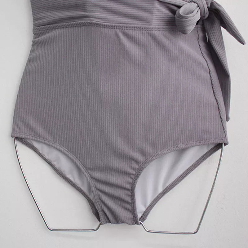 One-piece swimsuit in solid color with chest pad, sizes M, L, XL