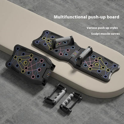 Set of black ABS plastic push up support plates on a floor, fitness equipment for chest and arm training.