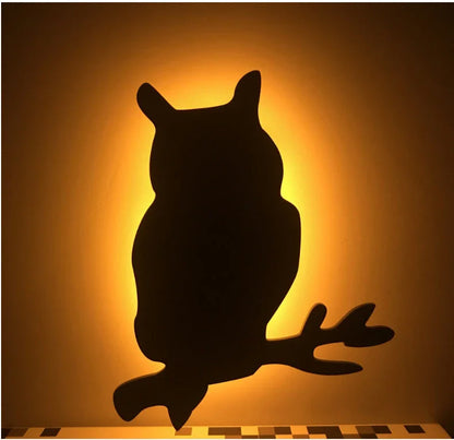 Illuminating pet-themed night light with smart sound sensor and customizable design