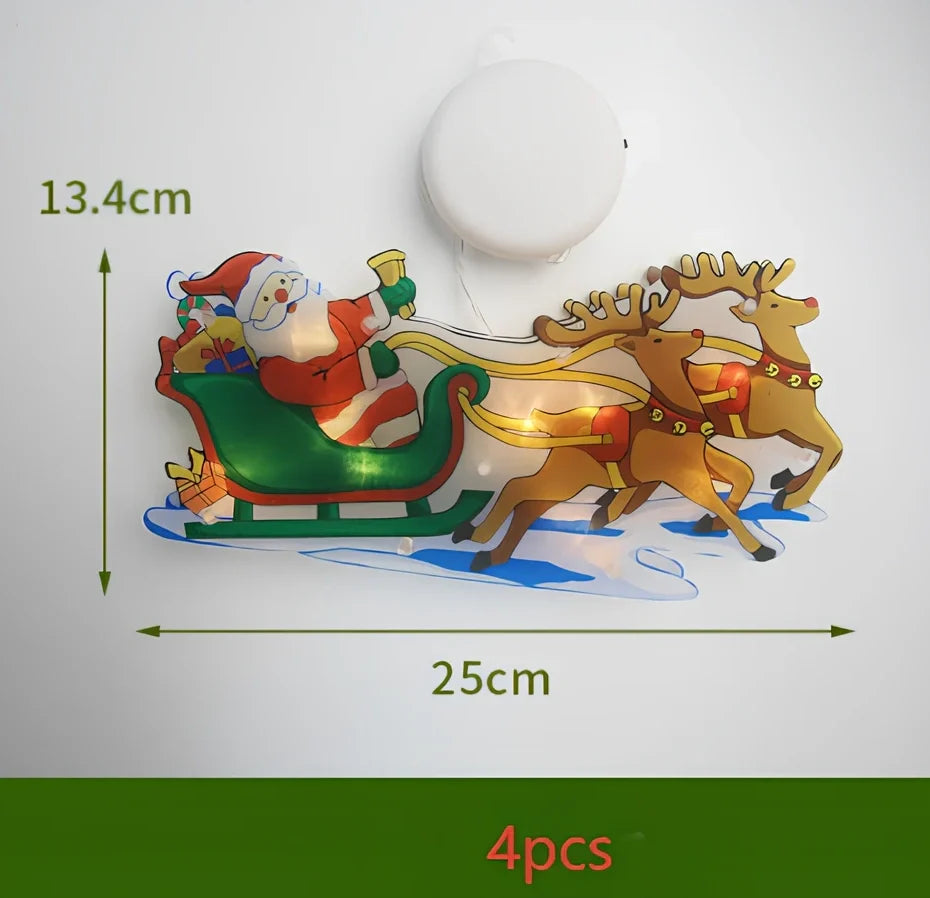 LED Christmas hanging lights with suction cups showing snowman design illuminated on window
