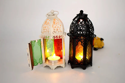 Wrought iron candle holder with 16cm height and 7cm diameter in black finish showing hanging design