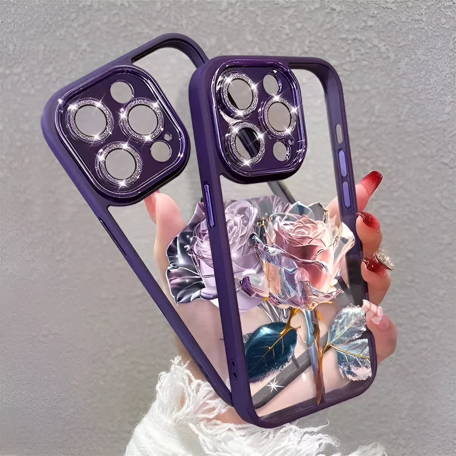 Dark purple TPU phone case with a rose pattern and a sparkly pink lens film for iPhone.