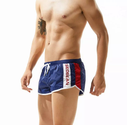 Men's lightweight polyester shorts for summer sports in various colors