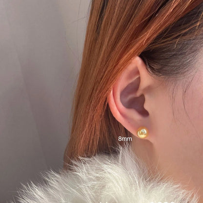 Large pearl stud earrings with geometric retro design and star elements in silver