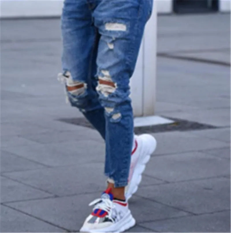 Men's distressed hole style jeans in deep blue cotton denim