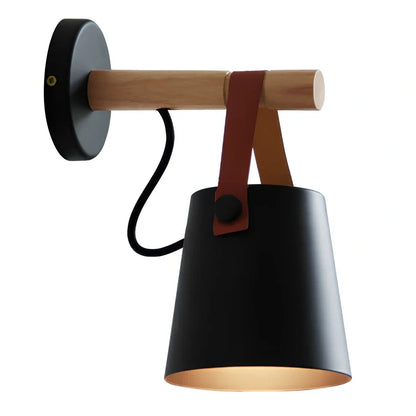 Scandinavian wall lamp with iron shade measuring 220mm by 130mm in black finish