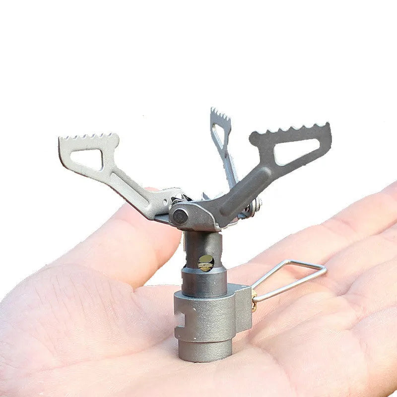 Portable camping stove with one-piece furnace structure, using propane fuel for outdoor cooking