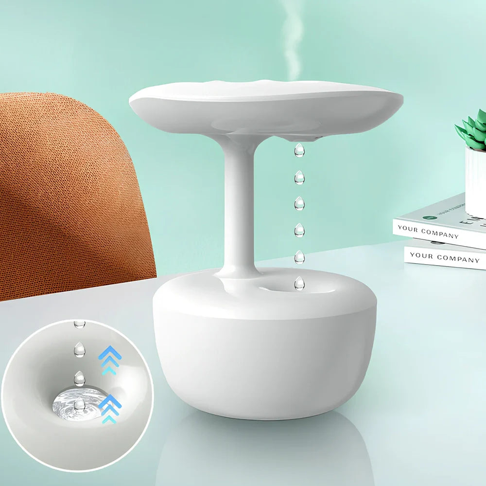 White lotus leaf shaped USB humidifier with mist output and LED illumination on wooden surface