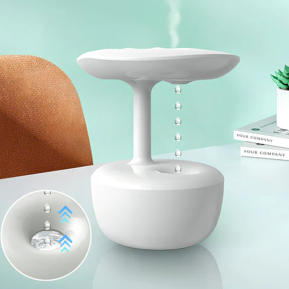 White lotus leaf shaped USB humidifier with mist output and LED illumination on wooden surface