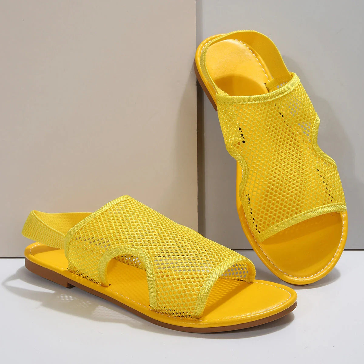 Breathable mesh sandals in various colors and sizes for men and women
