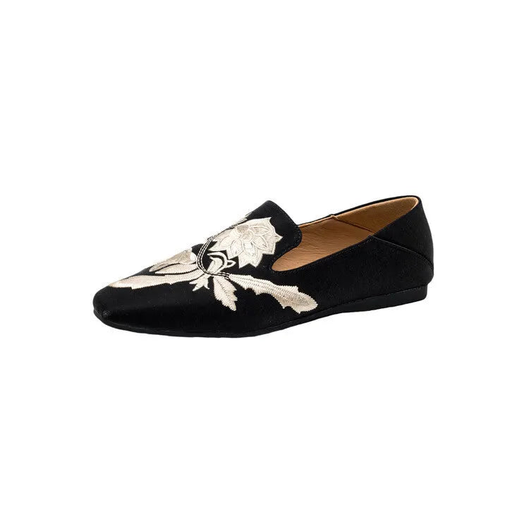 Women's black embroidery retro flat pumps with round toe and shallow-mouth design on a soft sole.