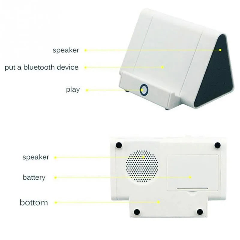 Small black wireless Bluetooth speaker for mobile phones and computers with charging cable