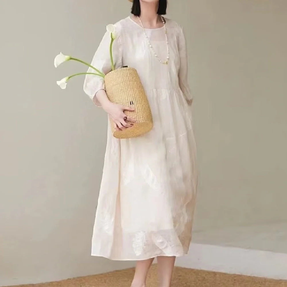 Women's white linen dress for summer, showcasing breathable and lightweight design