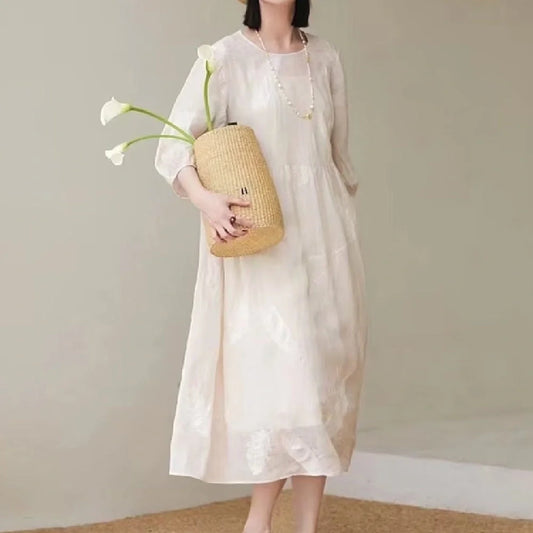 Women's white linen dress for summer, showcasing breathable and lightweight design