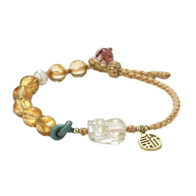 Hand-woven citrine crystal bracelet with animal zodiac designs in natural unisex style