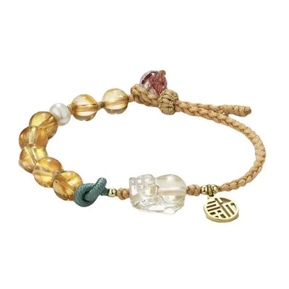 Hand-woven citrine crystal bracelet with animal zodiac designs in natural unisex style