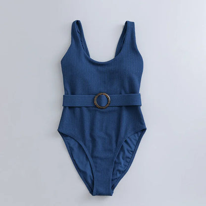 Navy blue women's one-piece swimsuit with triangle top and built-in chest pads for swimming