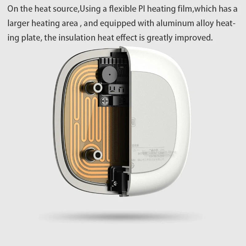 White 12V safety voltage heated base heating coaster on a wooden table