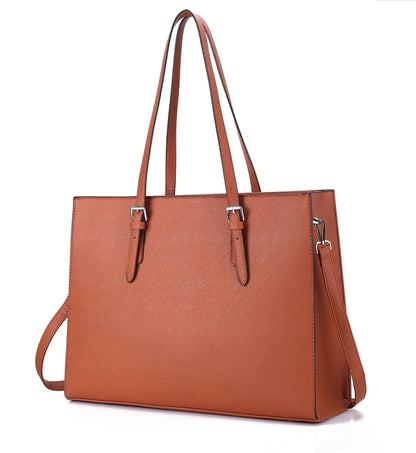 Black women's business computer bag with three shoulder straps showing internal organisation compartments