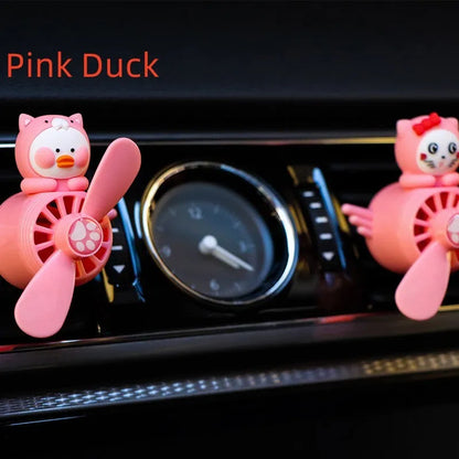 Set of four animal-themed car air vent clip ornaments: black husky, black cat, pink cat, and pink duck.
