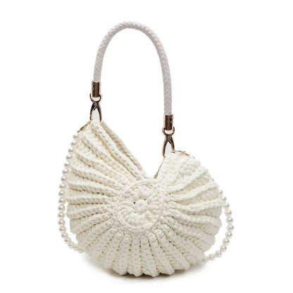Handmade woven cloth bag with double shoulder straps in shell shape showing open pocket design