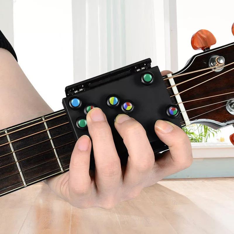 Chord Buddy Guitar Trainer with color-coded buttons for easy chord learning