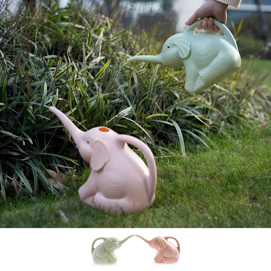 Pink elephant-shaped watering can with long nozzle for children and indoor plants.