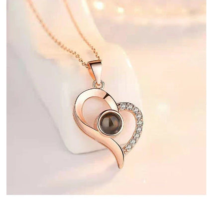 Handmade preserved roses in an elegant gift box with a crystal pendant necklace, representing eternal love and devotion