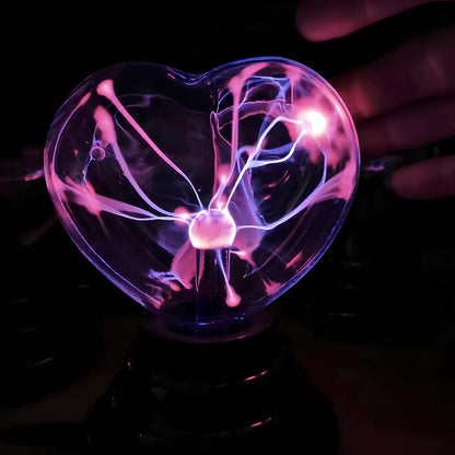 Plasma lightning ball with colourful electrostatic patterns inside 6-inch glass sphere responding to touch