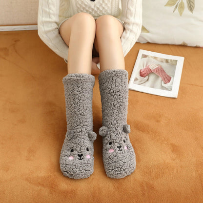Cozy coral fleece socks with unique Japanese-inspired cartoon designs, providing warm and comfortable indoor lounging and sleeping