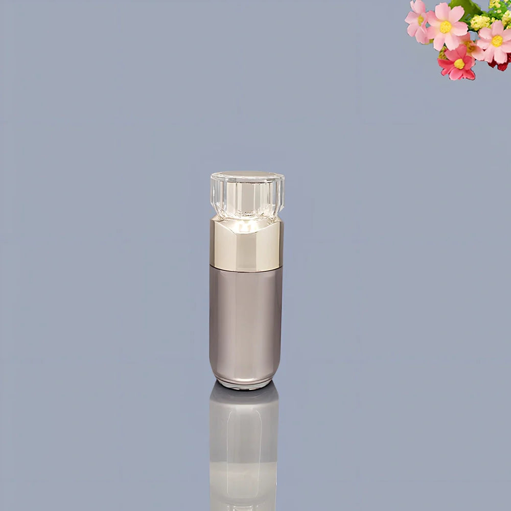 Acrylic cosmetics bottles in champagne gold and brushed white with vacuum sealing, various sizes from 5g to 120ml