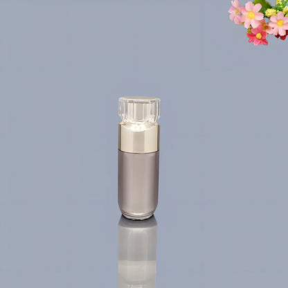 Acrylic cosmetics bottles in champagne gold and brushed white with vacuum sealing, various sizes from 5g to 120ml
