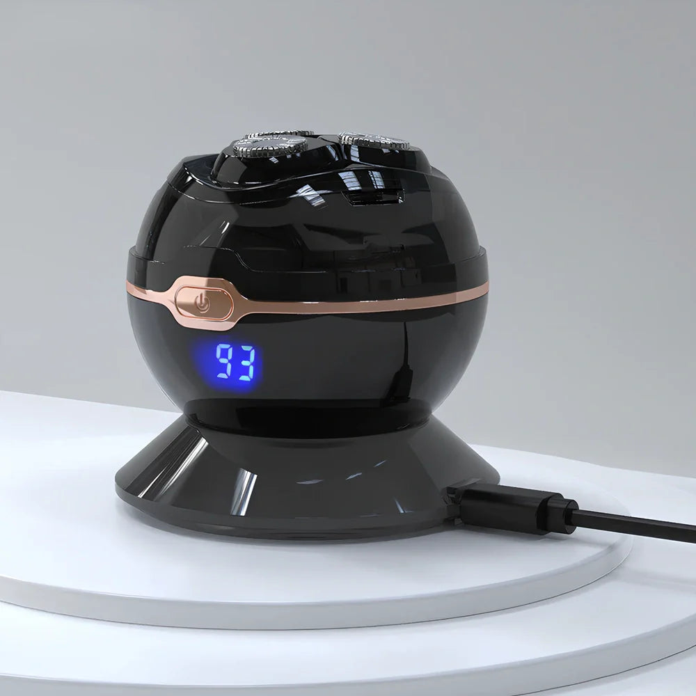 Black spherical wireless shaver with magnetic cutter heads on charging base showing digital battery display