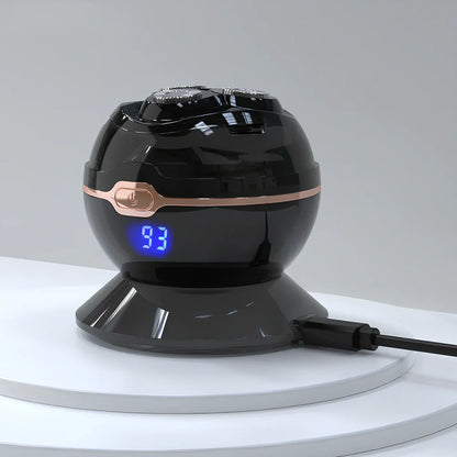 Black spherical wireless shaver with magnetic cutter heads on charging base showing digital battery display