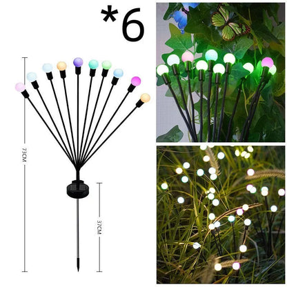 Solar-powered ground plug lawn light with automatic dusk-to-dawn operation and multiple head configurations
