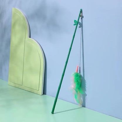 Green interactive cat feather wand toy with bell for durable feline play and stimulation