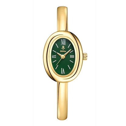 Women's oval retro quartz watch in gold colour with slim 8mm case thickness