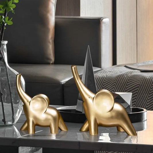 Modern simplicity style resin elephant ornament in rose gold or white, shown in large and small sizes.