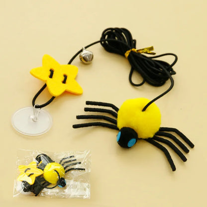 Cat toy hanging from door with elastic rope, colourful feather, bell and soft spider decoration
