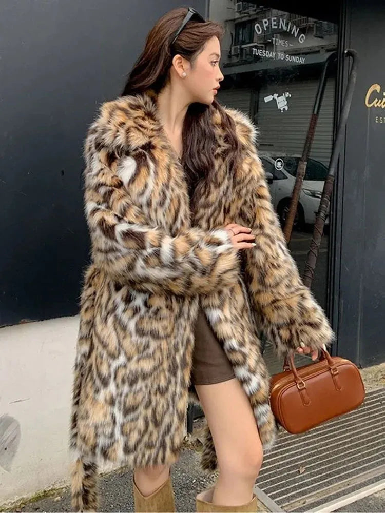 Faux fur coat with 80cm length, fur collar, and street fashion pockets in artificial fur fabric