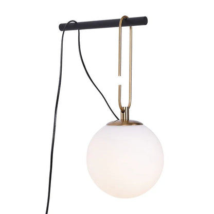 Modern glass wall lamp mounted on a wall, showcasing its clean design and adjustable light colour options.