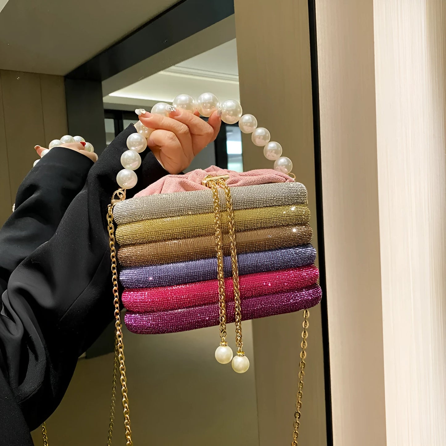 Women's soft PU crossbody bag with beaded accents, round shape, and single shoulder strap in black colour.