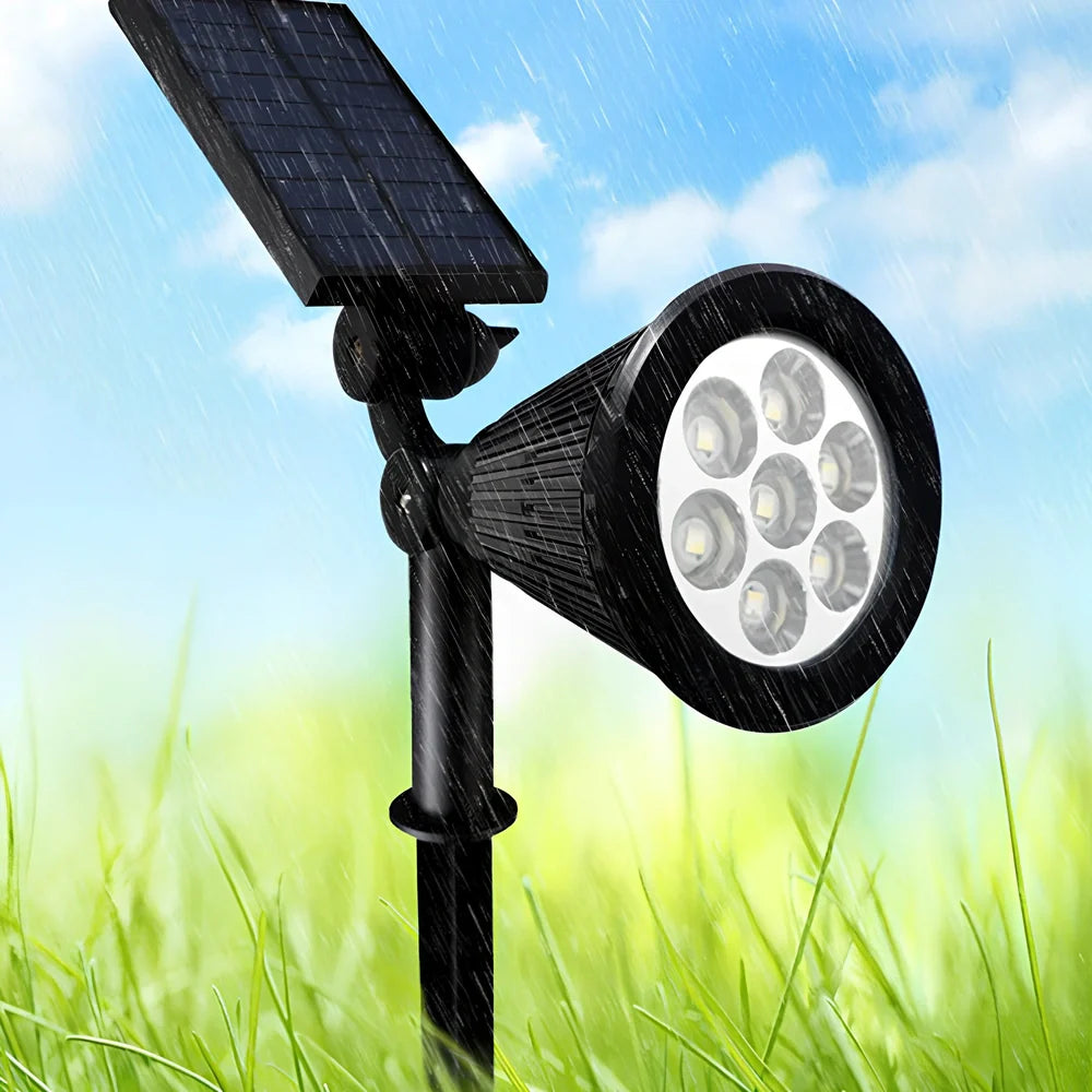 Solar lawn light with ground stake mounting, LED illumination, and waterproof housing for garden installation