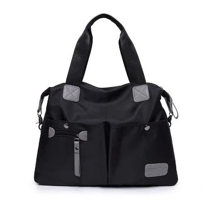 Versatile ladies handbag in various colors with multiple carry options, including handbag, shoulder bag, and crossbody styles, featuring durable construction and organizational pockets.