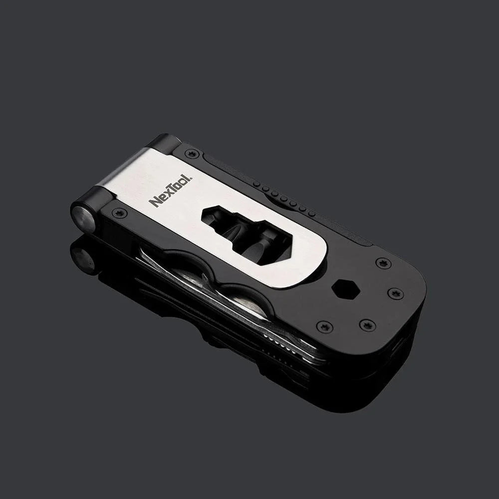 Compact, multi-function bicycle repair tool with wrench, tire spoon, and venting cap tools
