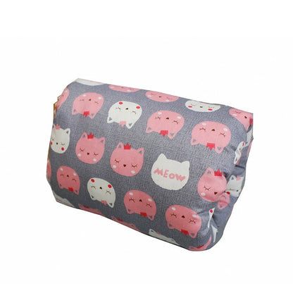 Adjustable cotton nursing pillow with various colorful designs, providing comfort and support for breastfeeding and bottle-feeding