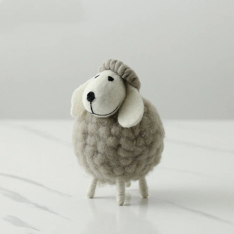 Adorable plush sheep decorations in various sizes and color combinations, perfect for adding a cozy, farmhouse-inspired touch to any home.