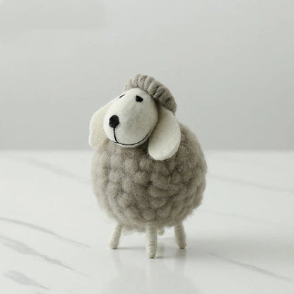 Adorable plush sheep decorations in various sizes and color combinations, perfect for adding a cozy, farmhouse-inspired touch to any home.