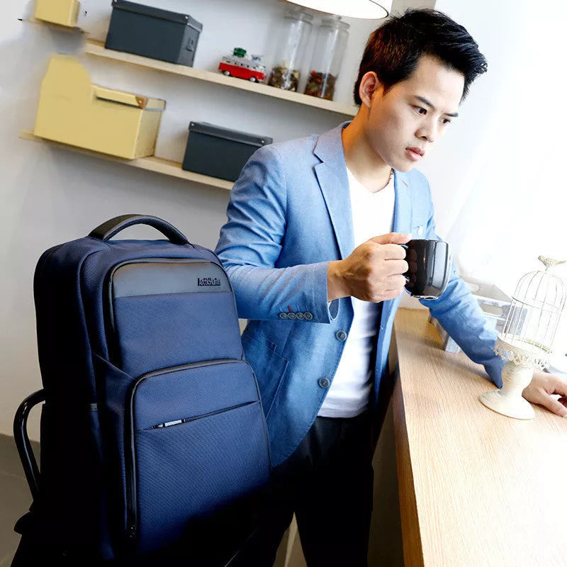 Men's USB charging anti-theft backpack in grey, blue, or black with multiple compartments