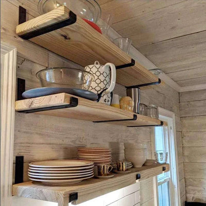 Sturdy black iron wall shelves with a rustic, industrial-chic design for organizing and displaying items in your home or office